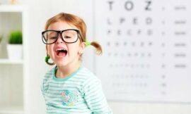 Little girl with big glasses on